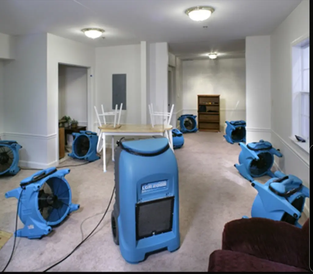 Air movers and dehumidifier setup for Water Damage Restoration in Albany